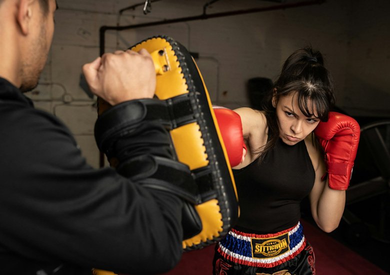 A woman practicing punching