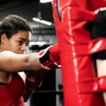 A woman taking part in a women's boxing session